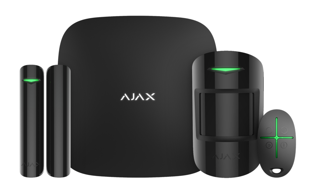 Mājas apsardzes komplekts “Ajax” melnā krāsā, kurā ietilpst četri elementi - centrāle, kustību detektors, magnētiskais detektors, breloks apsardzes uzlikšanai/noņemšanai